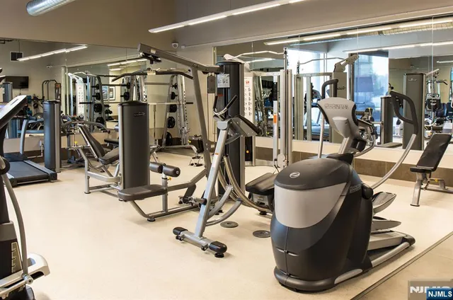 a view of a room with gym equipment