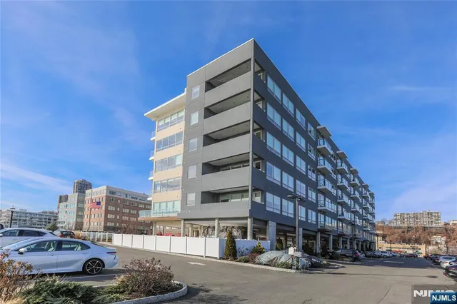 a city street lined with tall buildings