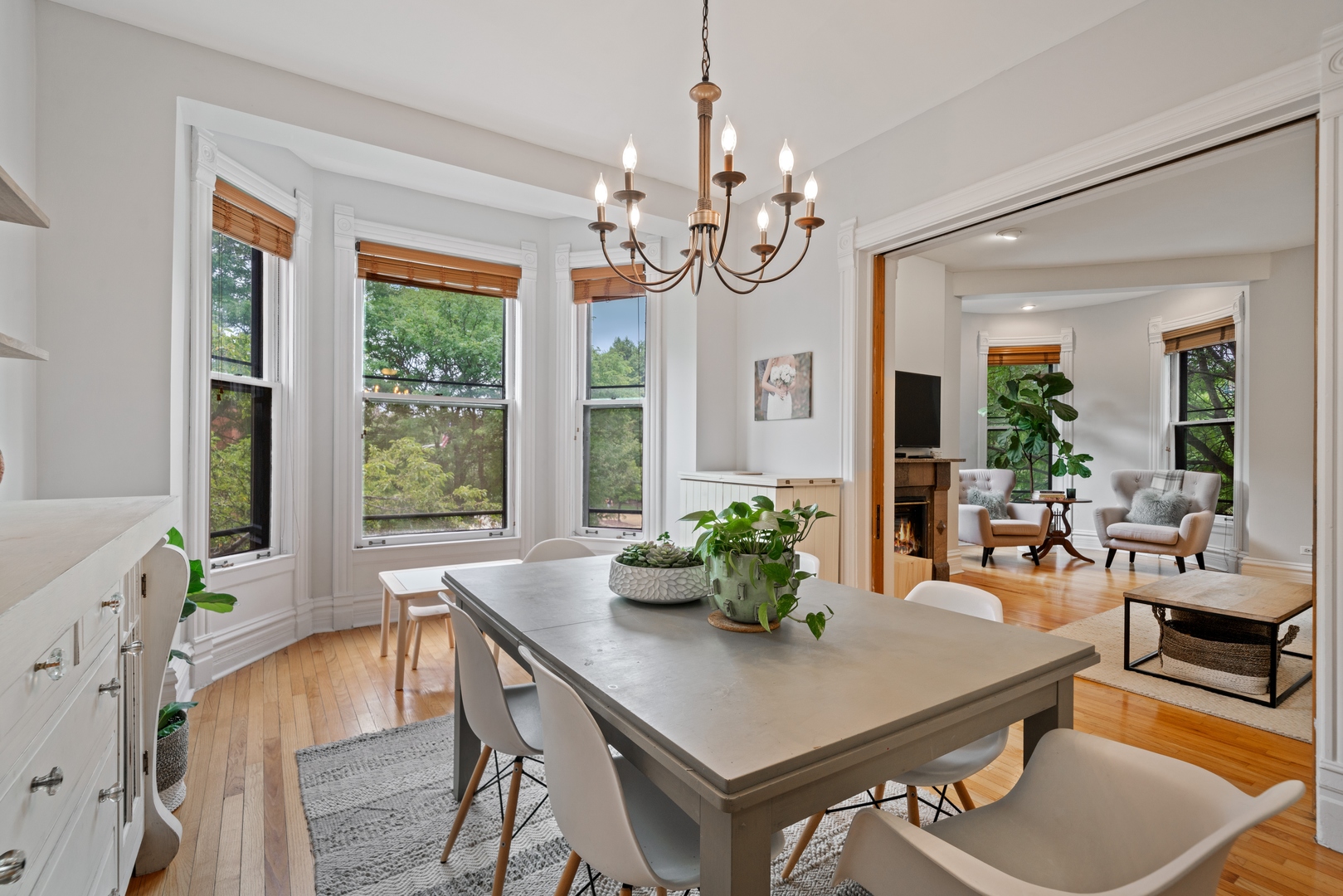 1125 West Belden Avenue, Unit 2 Chicago, IL 60614 - Photo 2 of 10 a view of a dining room with furniture window and wooden floor