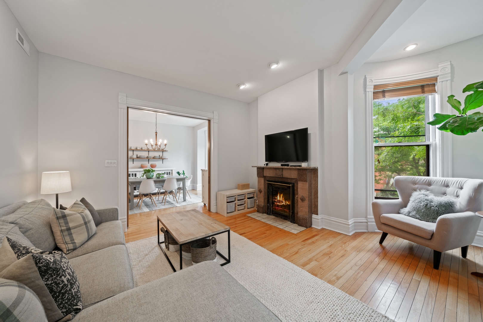 1125 West Belden Avenue, Unit 2 Chicago, IL 60614 - Photo 5 of 10 a living room with furniture and a fireplace