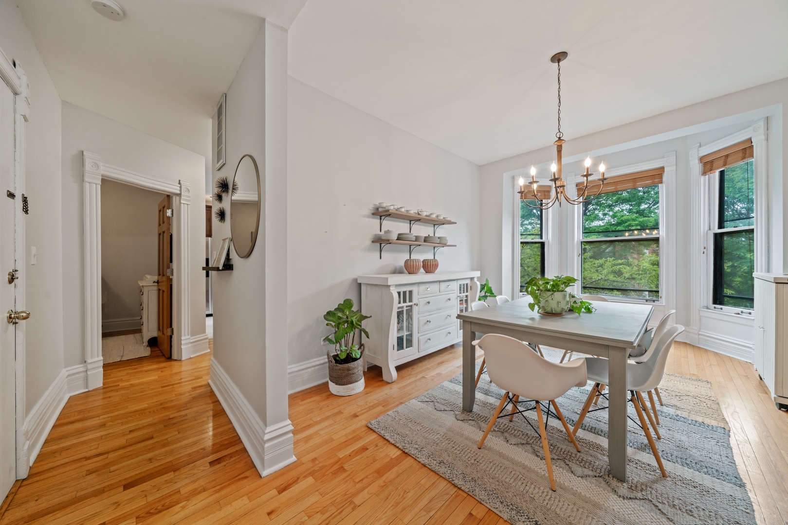 1125 West Belden Avenue, Unit 2 Chicago, IL 60614 - Photo 6 of 10 a living room with furniture and a chandelier