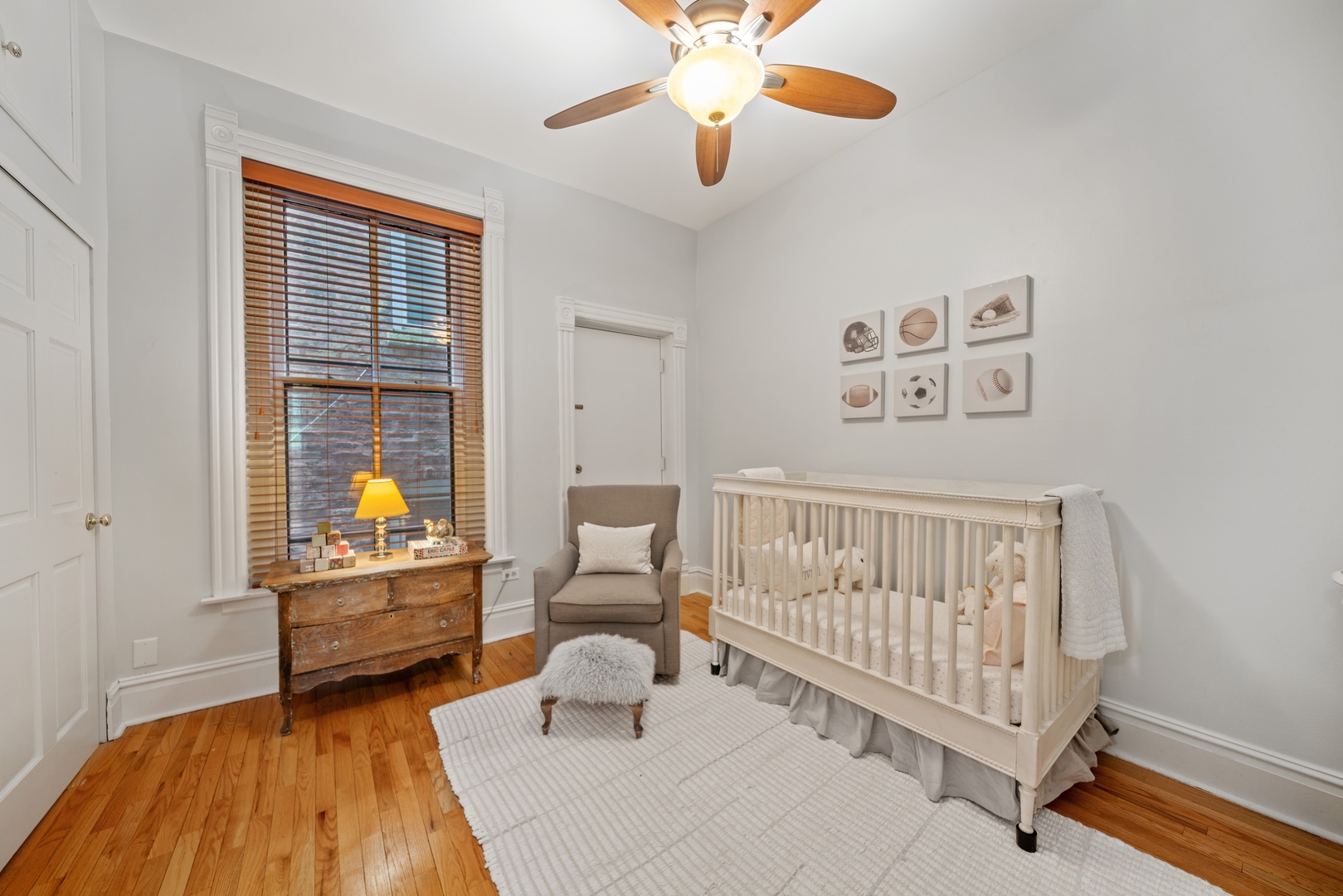 1125 West Belden Avenue, Unit 2 Chicago, IL 60614 - Photo 9 of 10 a bedroom with furniture and a window