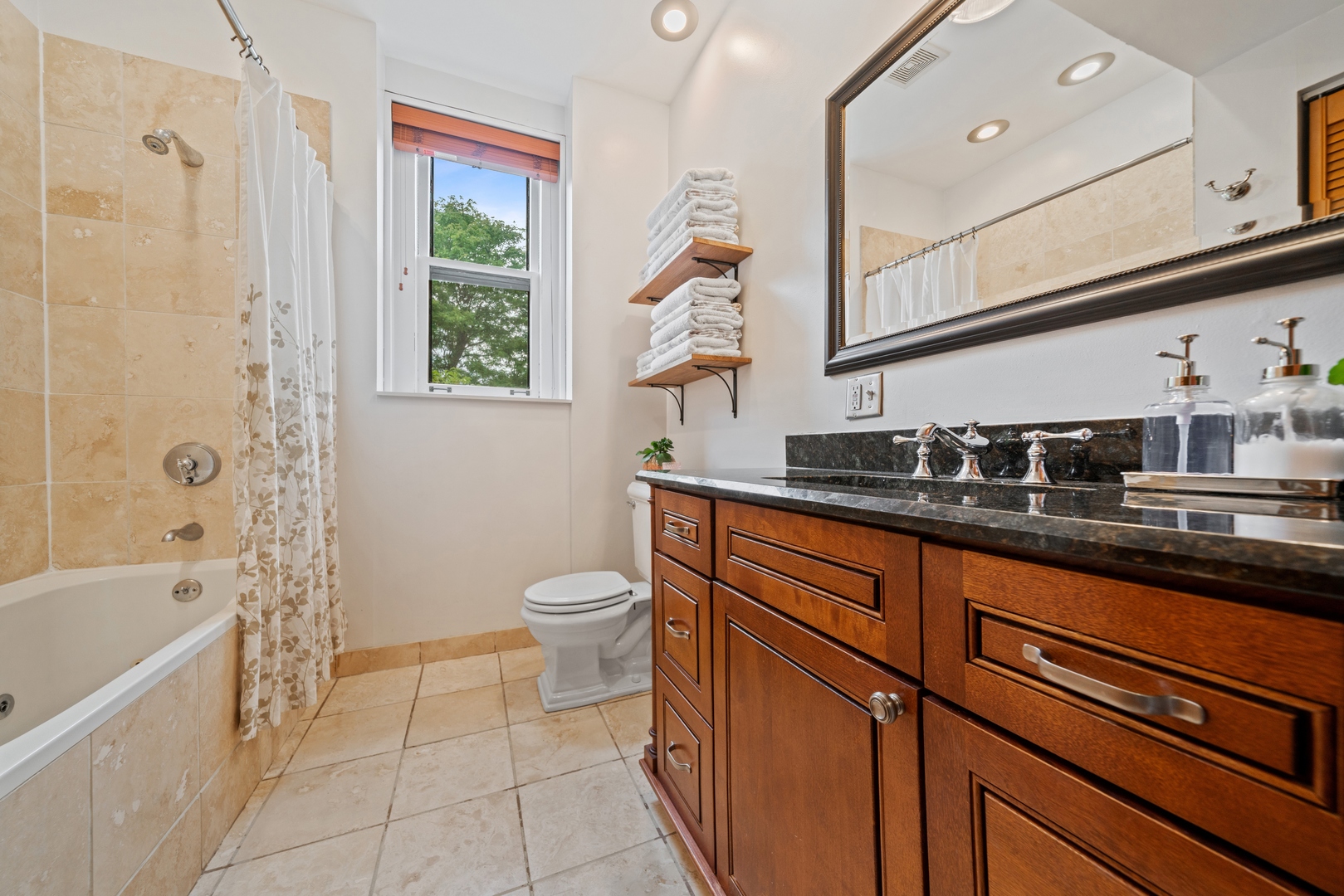 1125 West Belden Avenue, Unit 2 Chicago, IL 60614 - Photo 10 of 10 a bathroom with a sink a toilet and bathtub