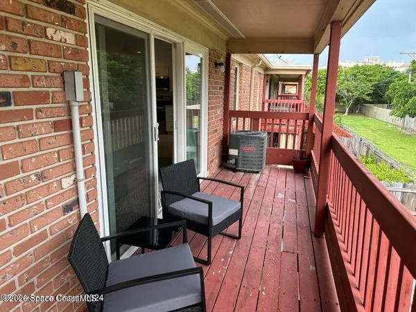 front view of a house with a garden