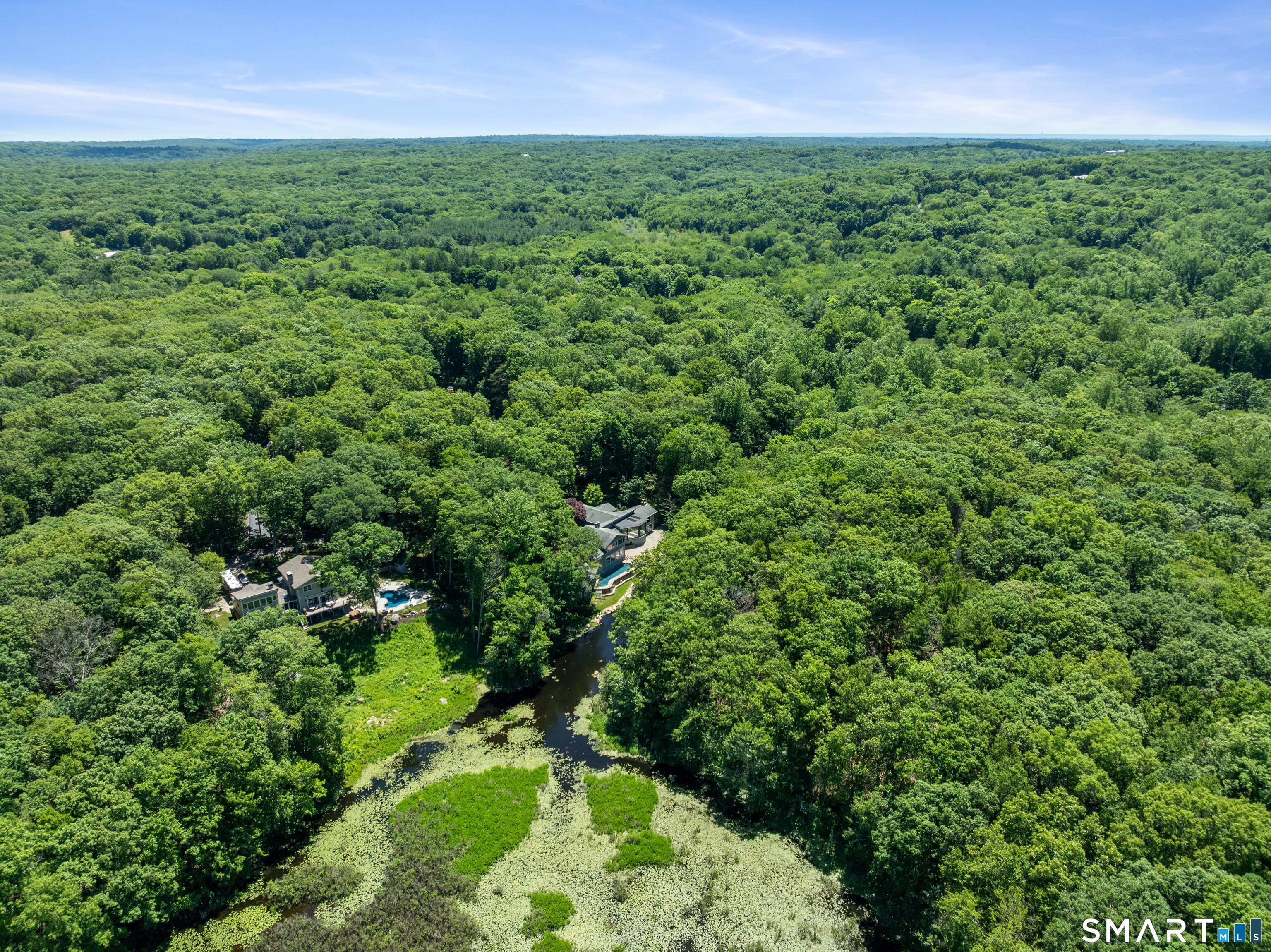 22 Pent Road Weston, CT 06883 - Photo 18 of 18 an aerial view of residential houses with outdoor space and trees