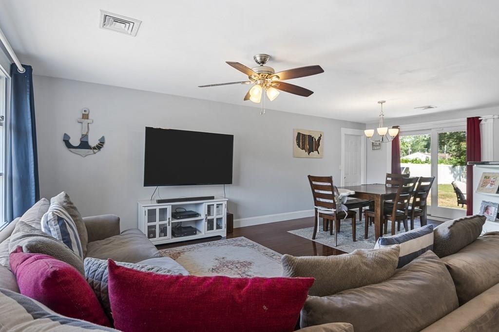 266 Bushee Road Swansea, MA 02777 - Photo 11 of 33 a living room with furniture and a flat screen tv