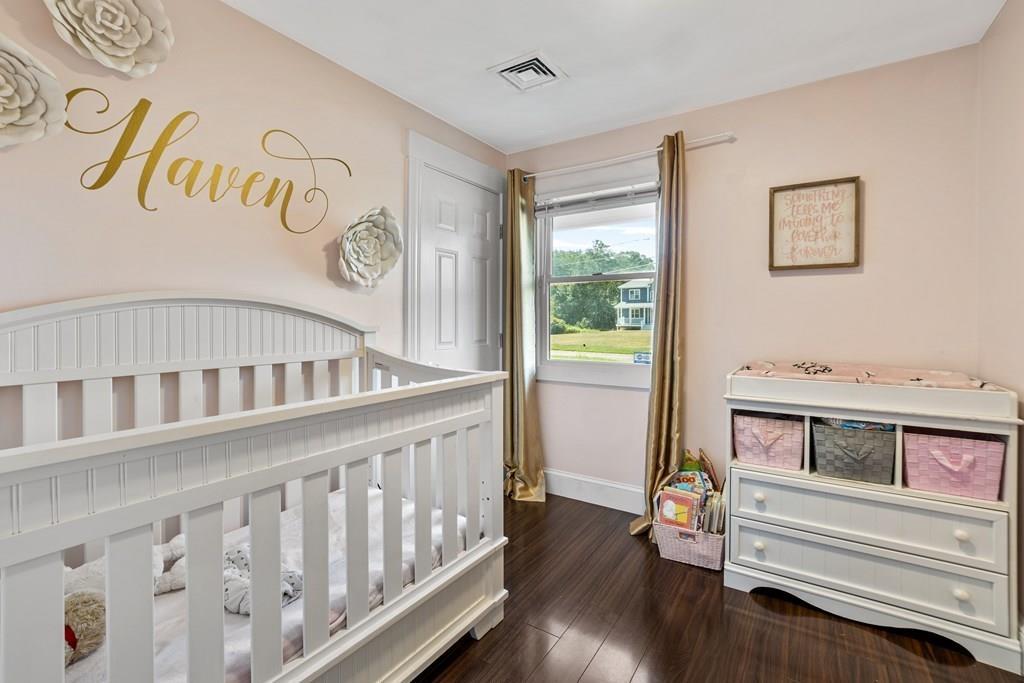 266 Bushee Road Swansea, MA 02777 - Photo 17 of 33 a view of a hallway with wooden floor and entryway