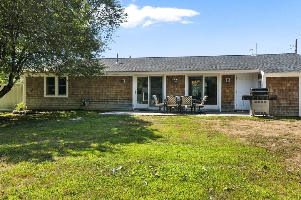 266 Bushee Road Swansea, MA 02777 - Photo 2 of 33 a front view of house with yard and seating area