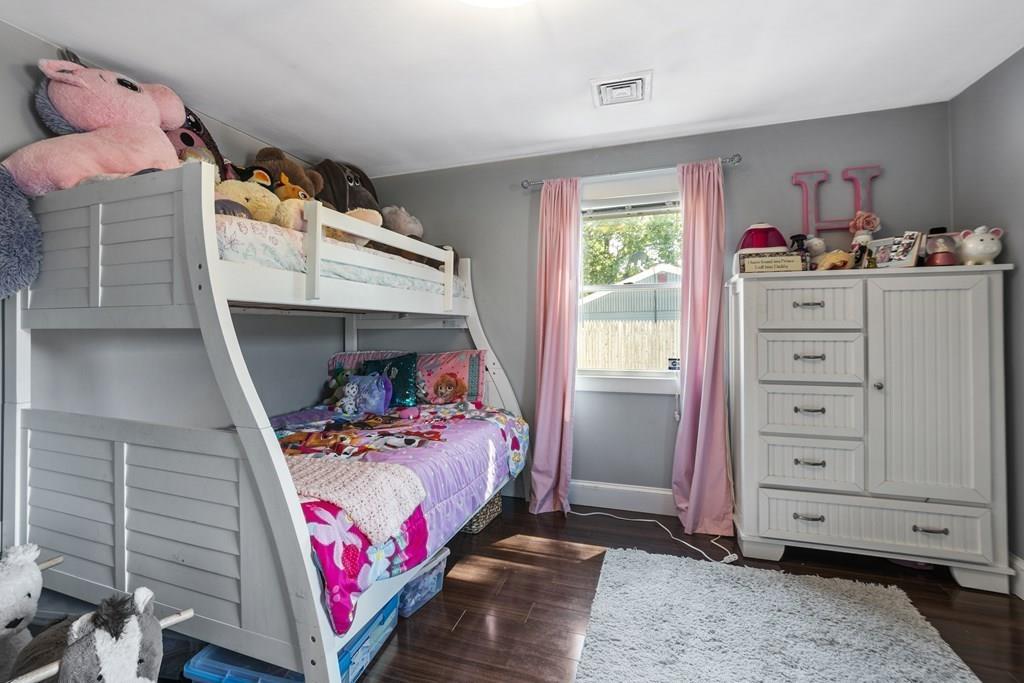 266 Bushee Road Swansea, MA 02777 - Photo 21 of 33 a bedroom with a bed and a window