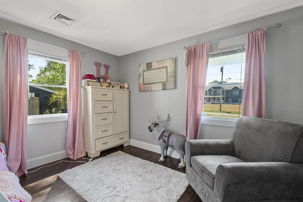 266 Bushee Road Swansea, MA 02777 - Photo 22 of 33 a living room with furniture and a window