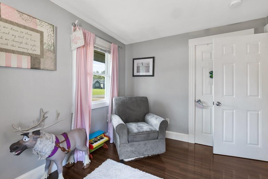 266 Bushee Road Swansea, MA 02777 - Photo 23 of 33 a living room with furniture and wooden floor