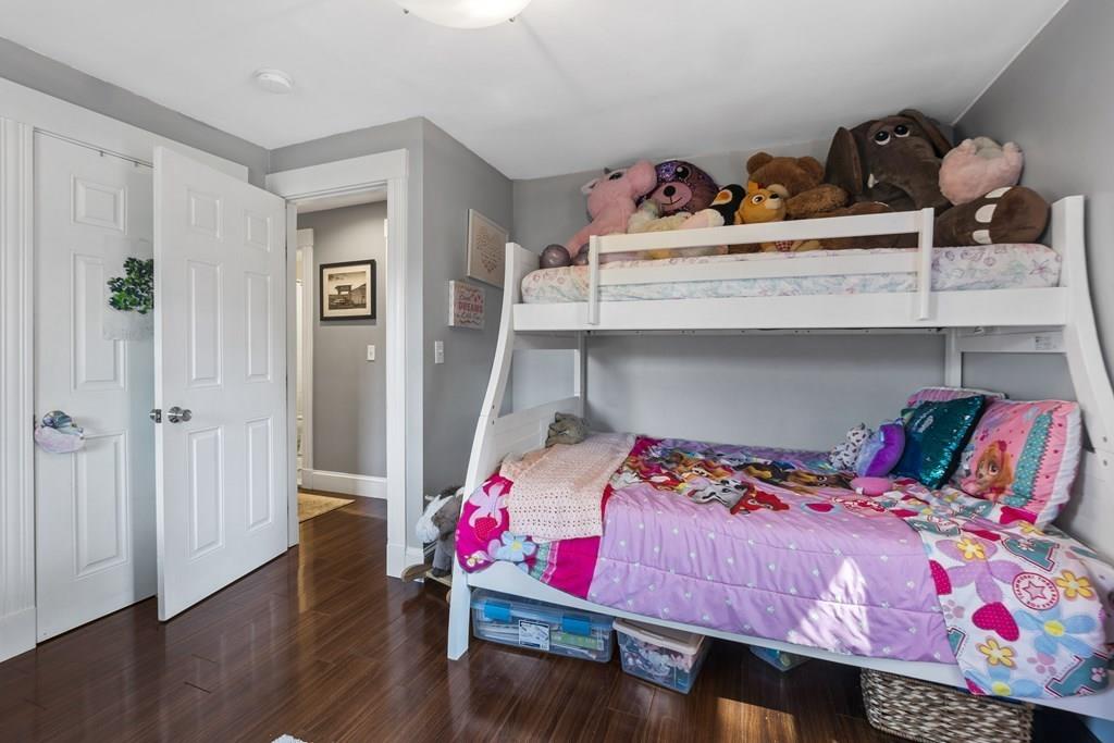 266 Bushee Road Swansea, MA 02777 - Photo 24 of 33 a bedroom with a bed and wooden floor