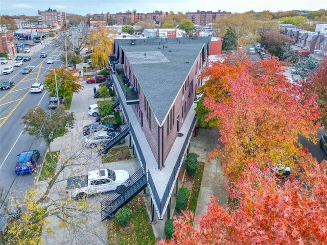 an aerial view of a house with outdoor space