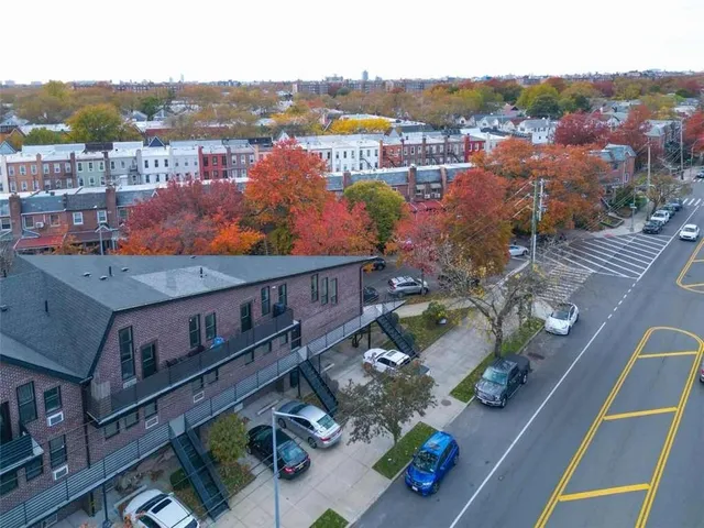an aerial view of a house with outdoor space