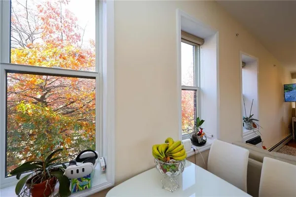 a view of a living room and dining room