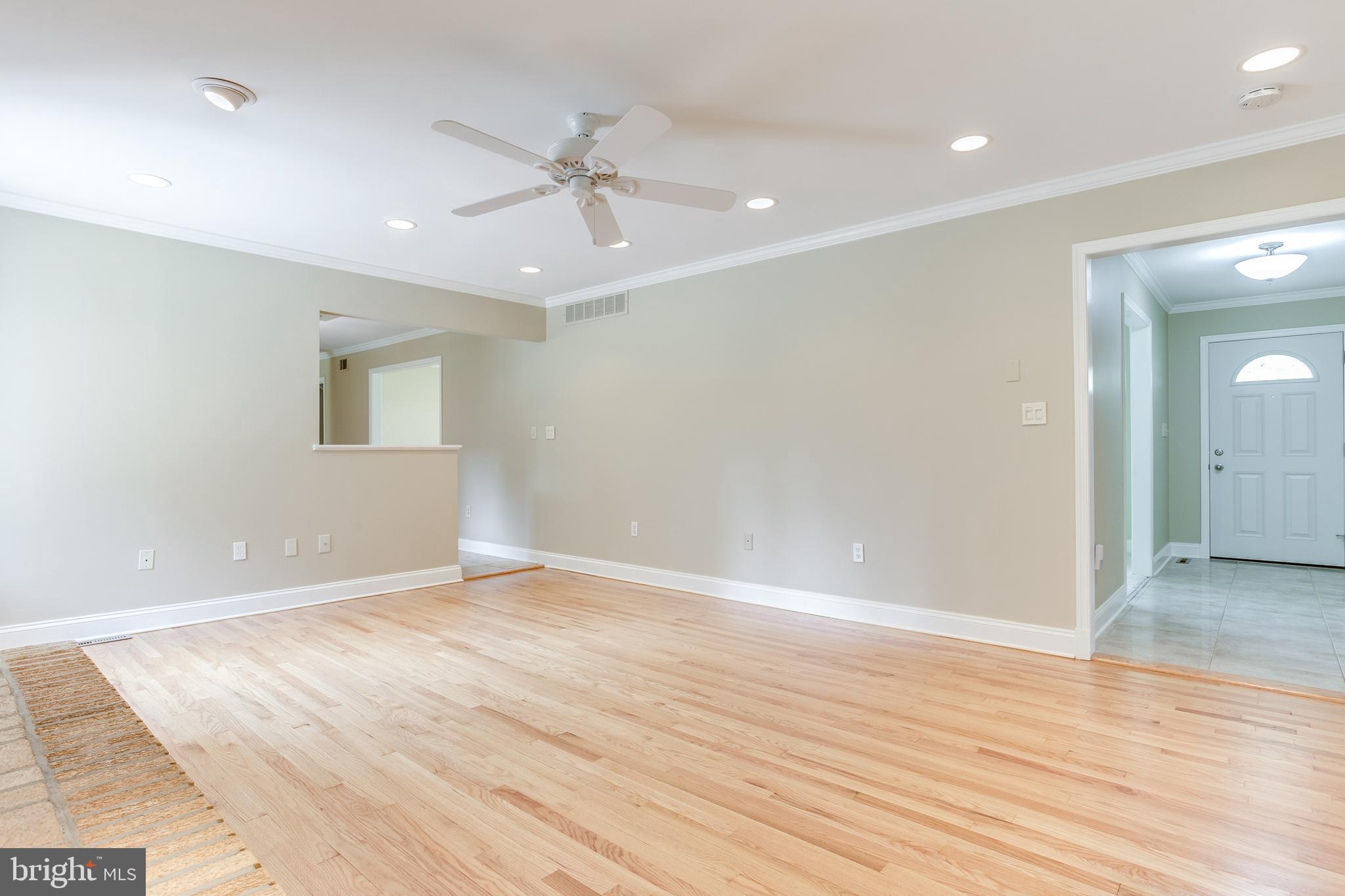 3907 Eland Road Phoenix, MD 21131 - Photo 12 of 33 Family Room w/ Hardwood Floors & Gas Fireplace