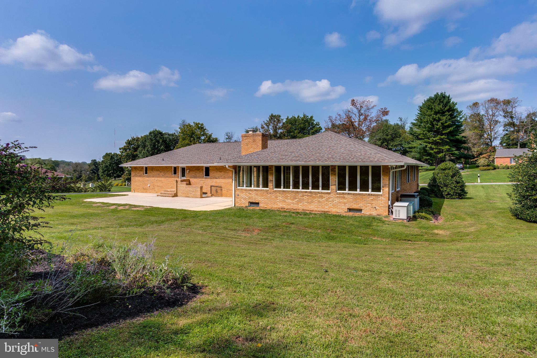 3907 Eland Road Phoenix, MD 21131 - Photo 30 of 33 Rear Exterior & Spacious Patio