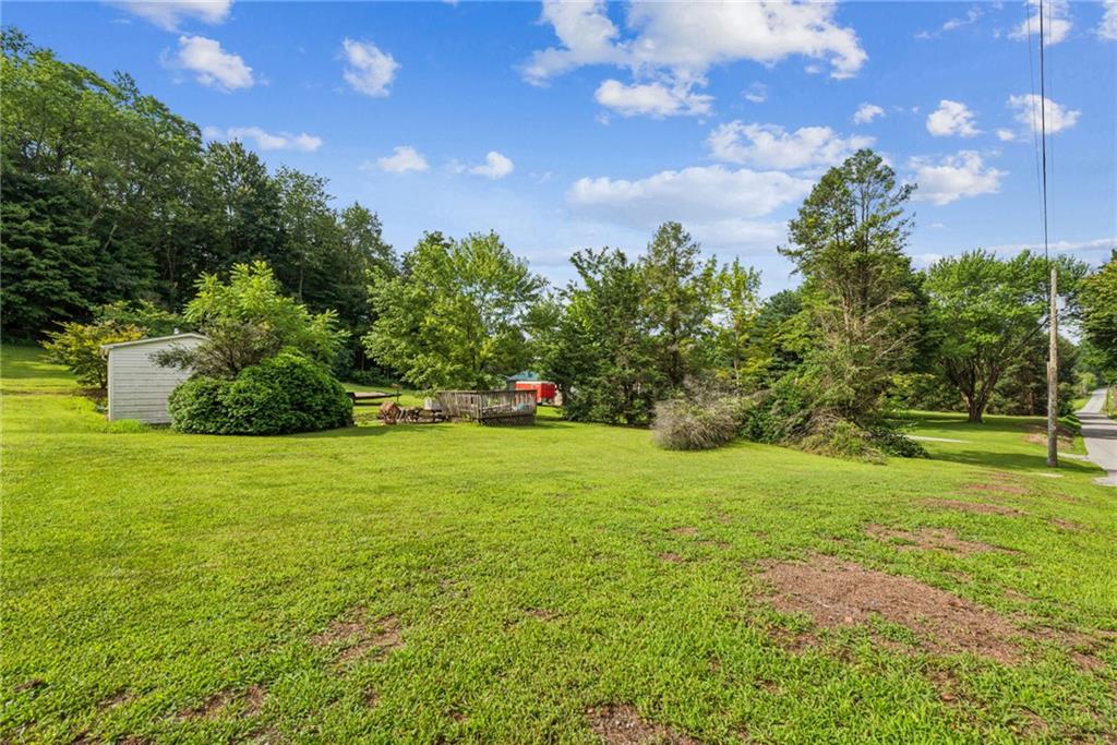 517 Atlantic Road Derry, PA 15627 - Photo 4 of 5 a view of a field of grass and trees