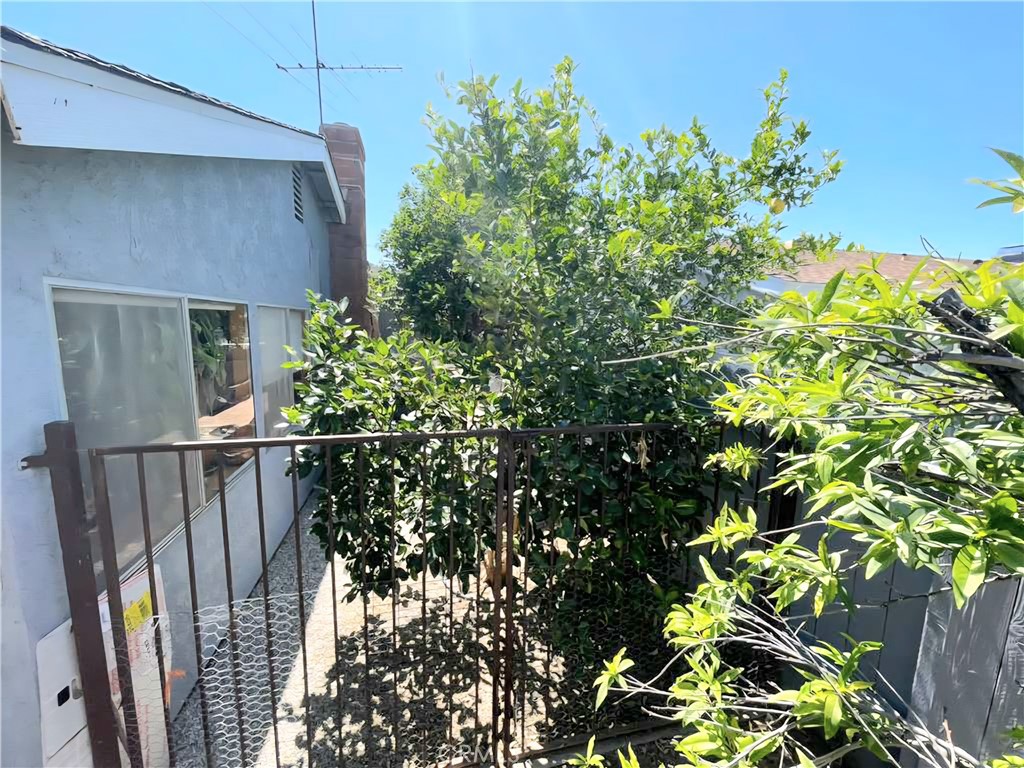4267 Baggett Drive Riverside, CA 92505 - Photo 19 of 28 a view of a house with a tree