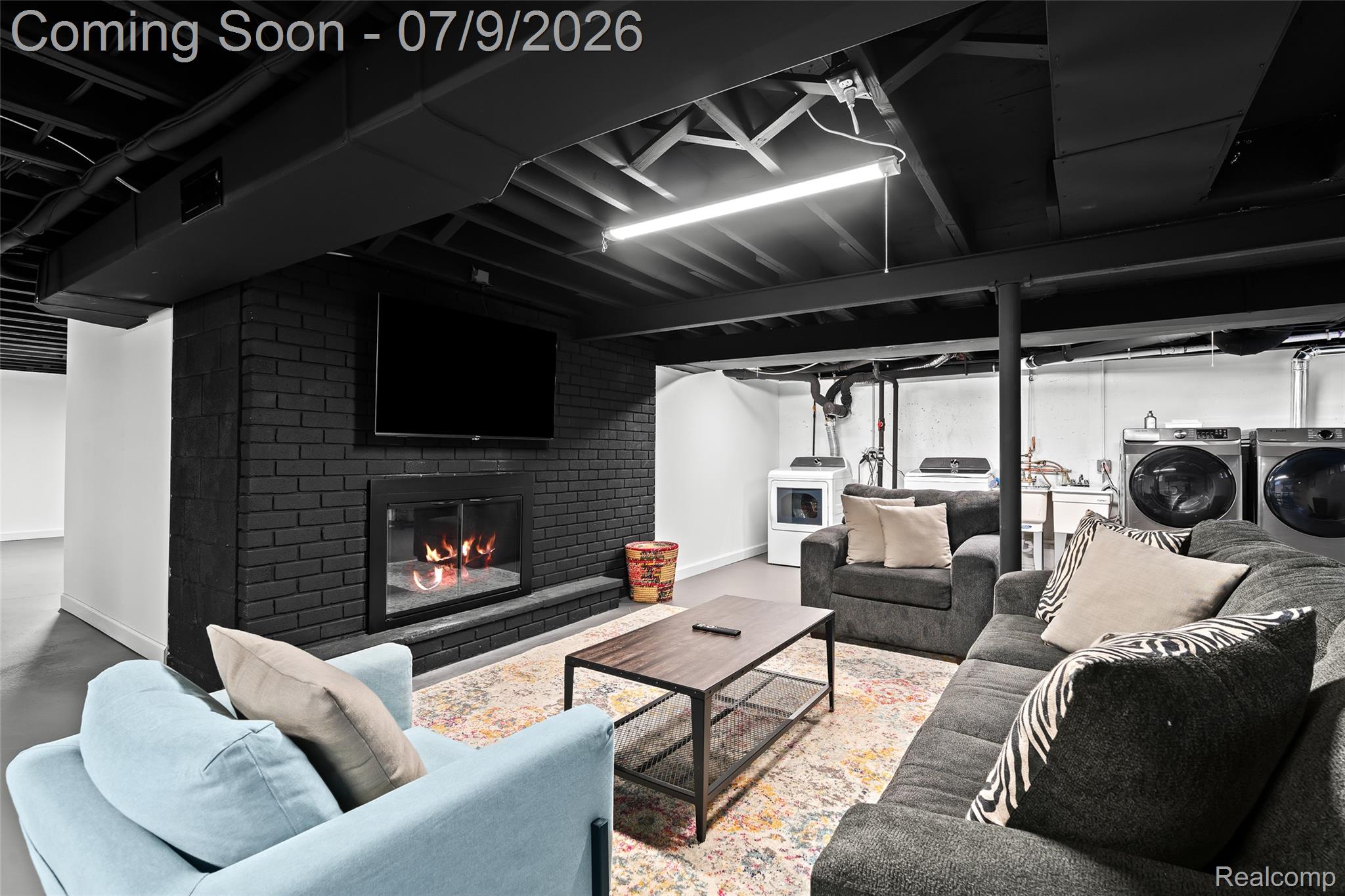 2566 Harrington Road Rochester, MI 48307 - Photo 51 of 64 2nd living room with Smart TV in the basement