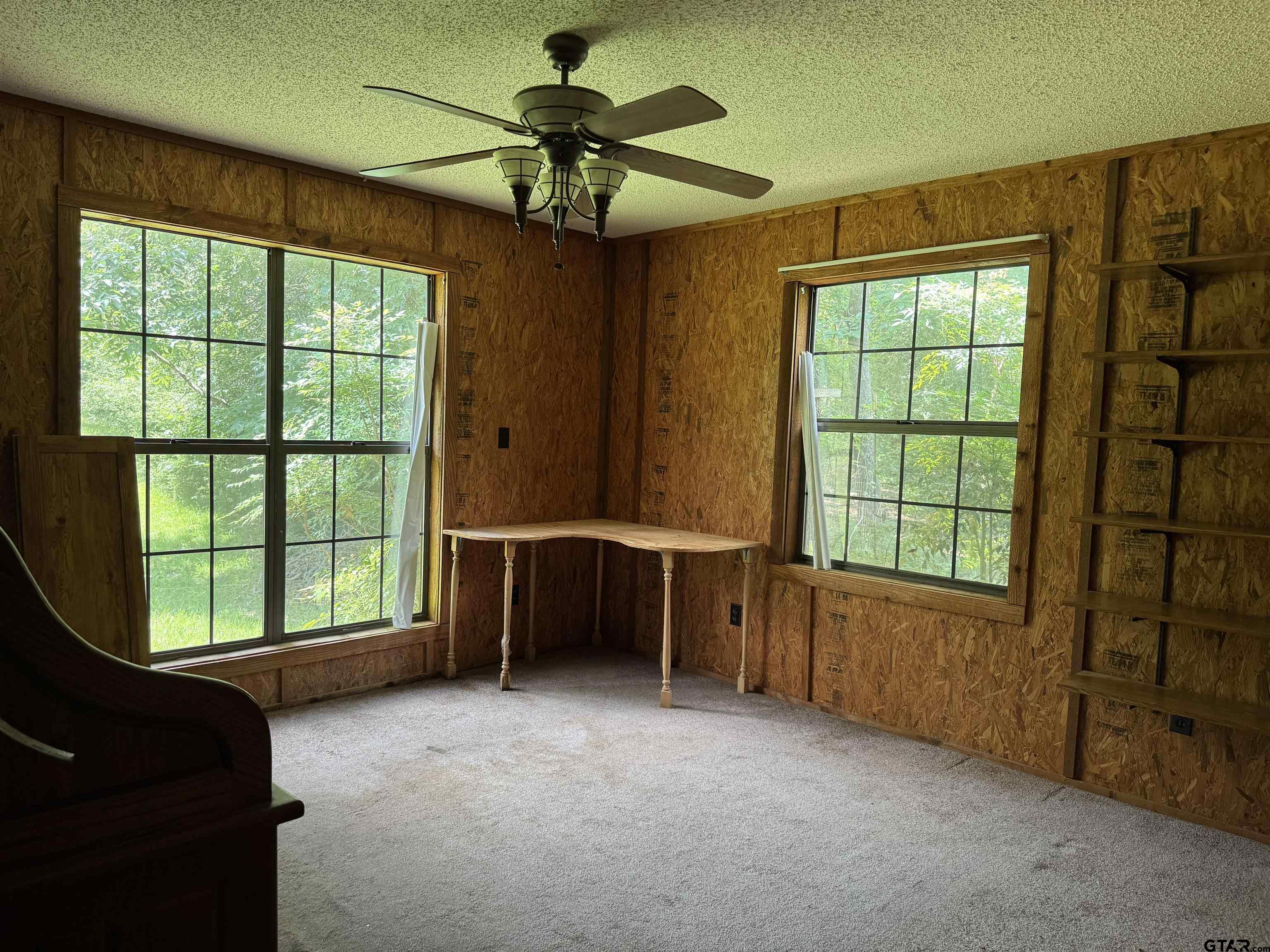 289 Llano Bend Holly Lake Ranch, TX 75765 - Photo 15 of 48 a view of an empty room with a window