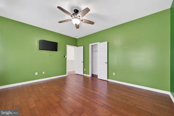 a backyard of a house with wooden fence