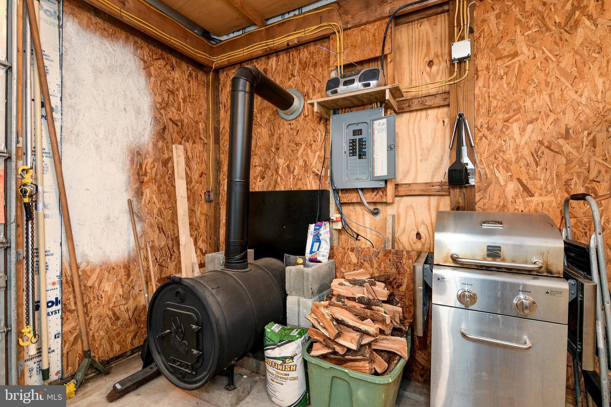 4234 Steele Neck Road Vienna, MD 21869 - Photo 38 of 39 Wood stove in shop