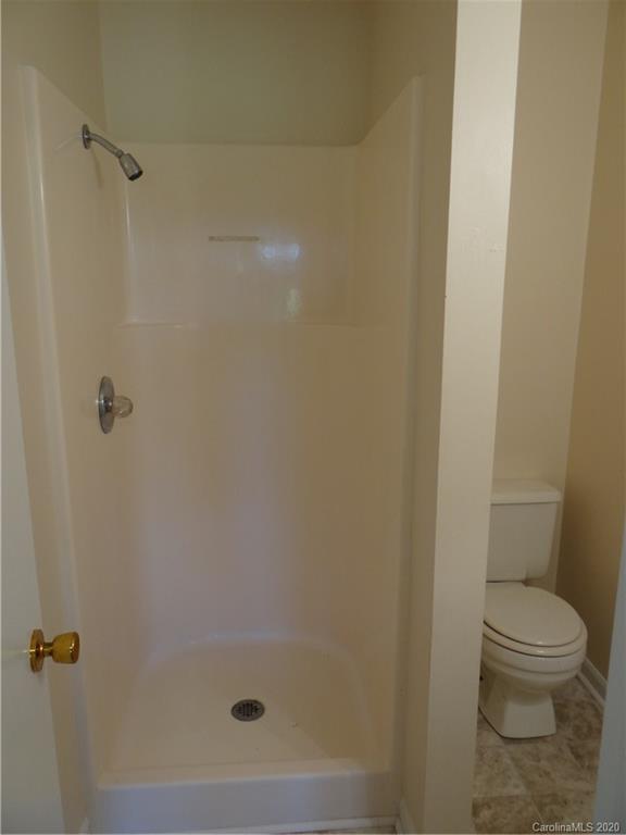 4315 Catawba Burris Road Denver, NC 28037 - Photo 14 of 20 a bathroom with a shower and a toilet