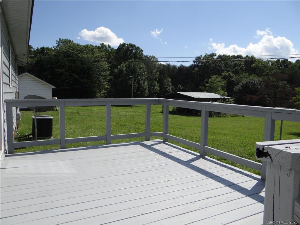 4315 Catawba Burris Road Denver, NC 28037 - Photo 5 of 20 a view of a tennis court with a small yard