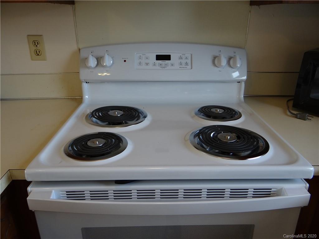 4315 Catawba Burris Road Denver, NC 28037 - Photo 9 of 20 a close view of stove and microwave