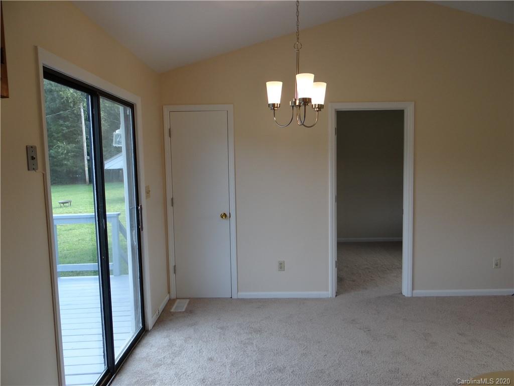 4315 Catawba Burris Road Denver, NC 28037 - Photo 10 of 20 a view of empty room with chandelier fan and window