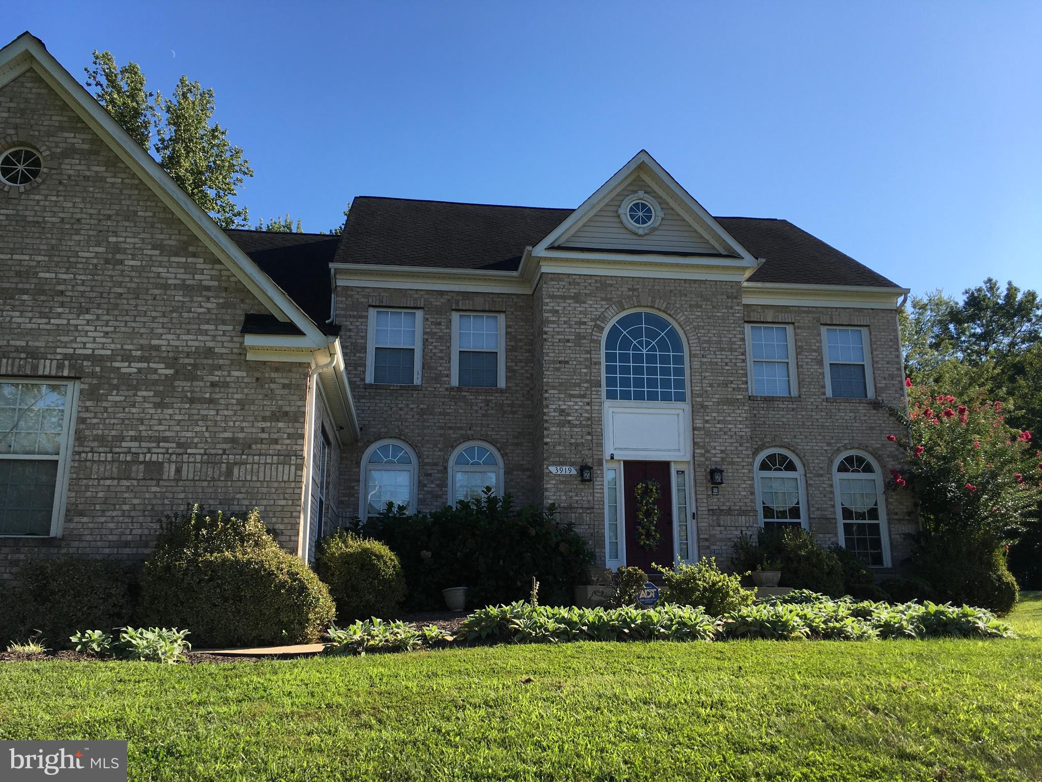3919 Woodreed Drive Brandywine, MD 20613 - Photo 2 of 88 a view of a house with a small yard and plants