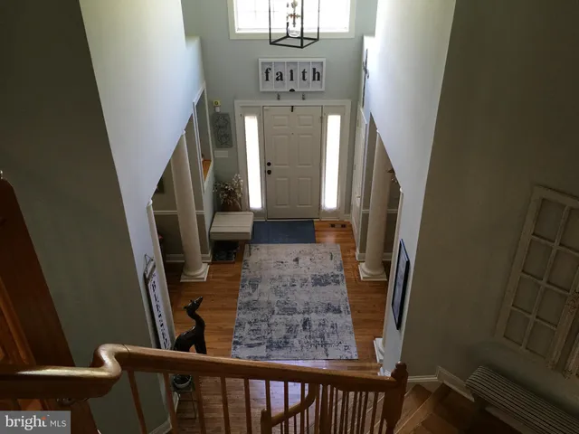 a room with furniture and wooden floor
