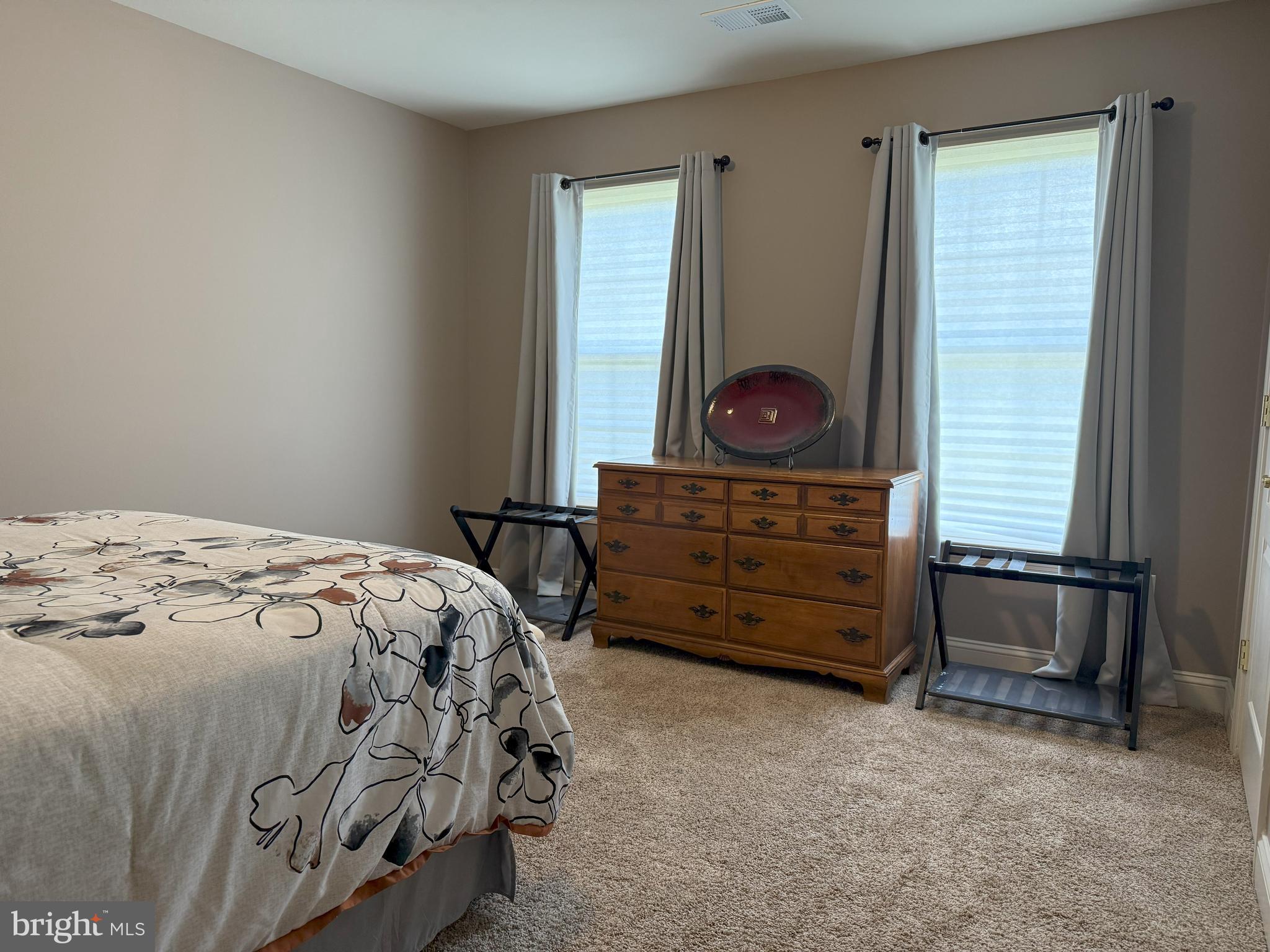 3919 Woodreed Drive Brandywine, MD 20613 - Photo 29 of 88 a bedroom with a bed and a dresser