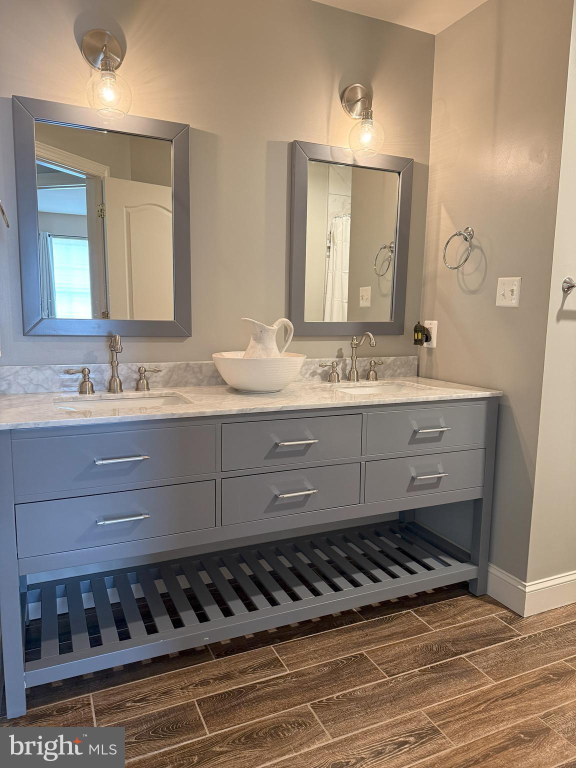 3919 Woodreed Drive Brandywine, MD 20613 - Photo 30 of 88 a bathroom with a sink and a mirror
