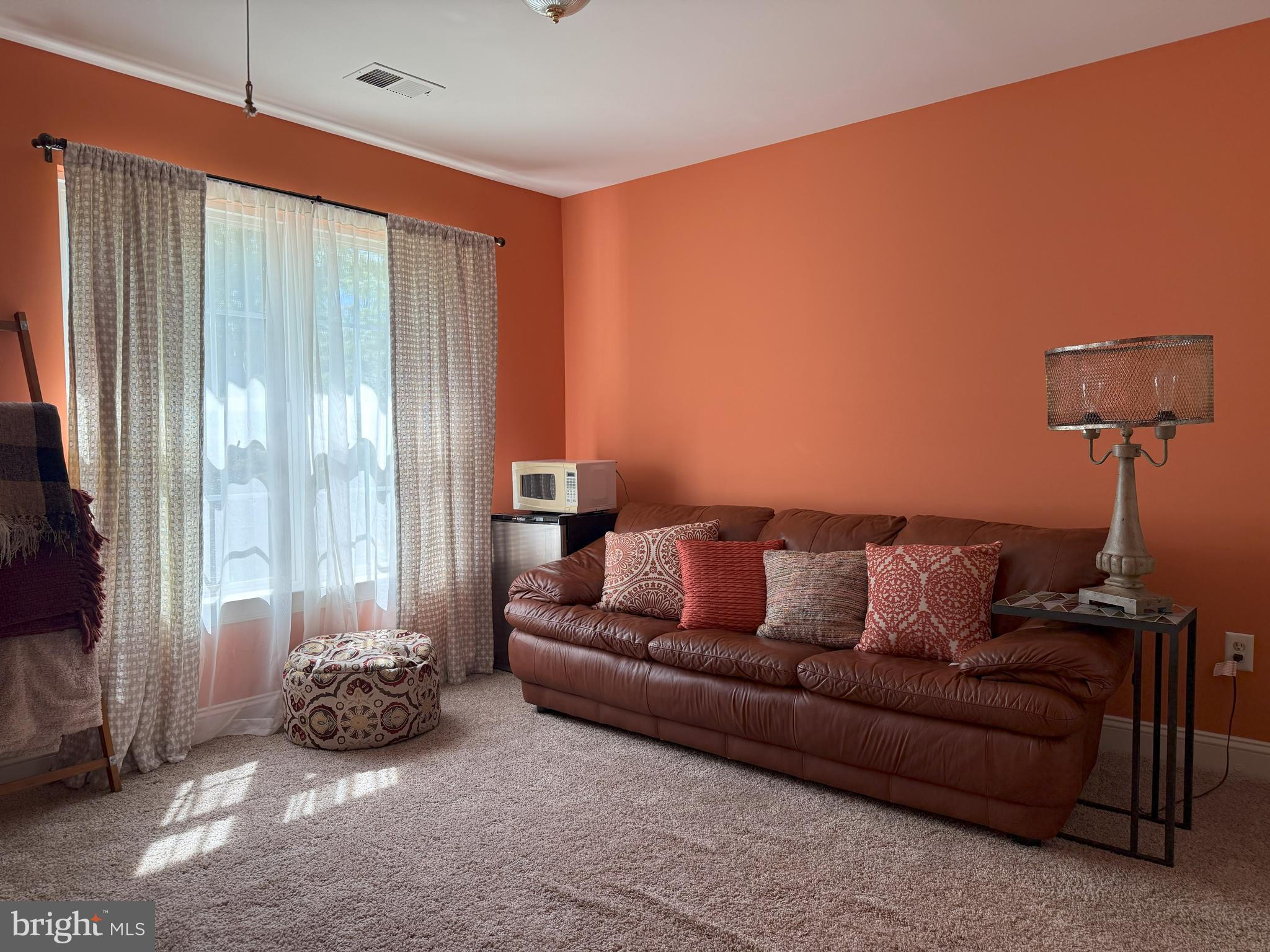 3919 Woodreed Drive Brandywine, MD 20613 - Photo 33 of 88 a living room with furniture and a window