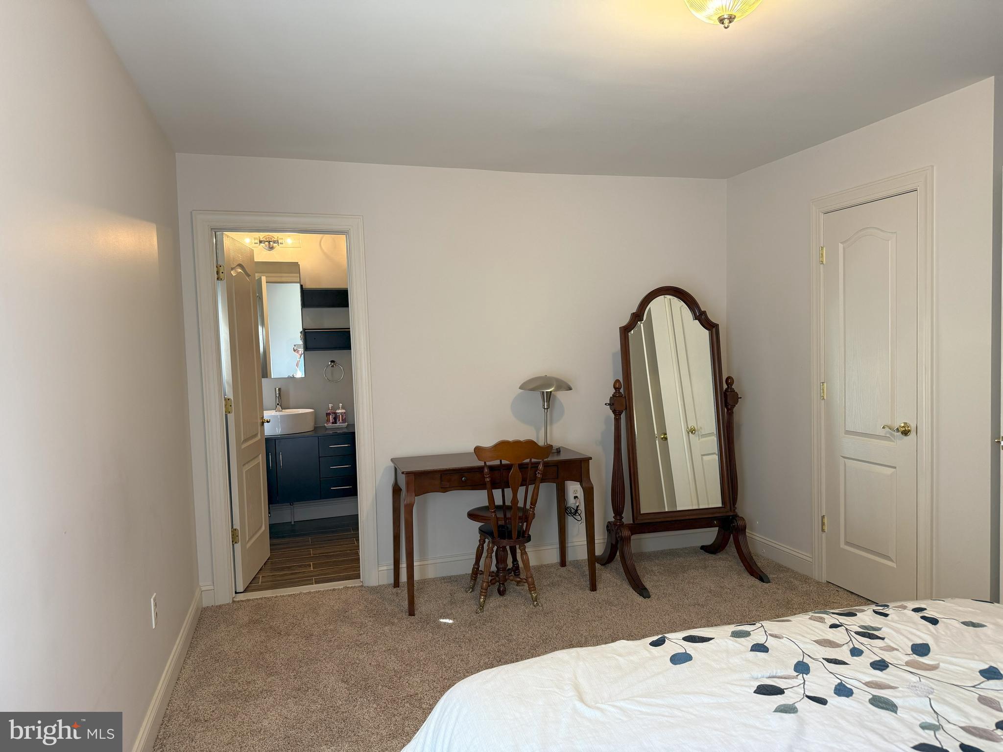 3919 Woodreed Drive Brandywine, MD 20613 - Photo 36 of 88 a bedroom with a bed and a view of bathroom