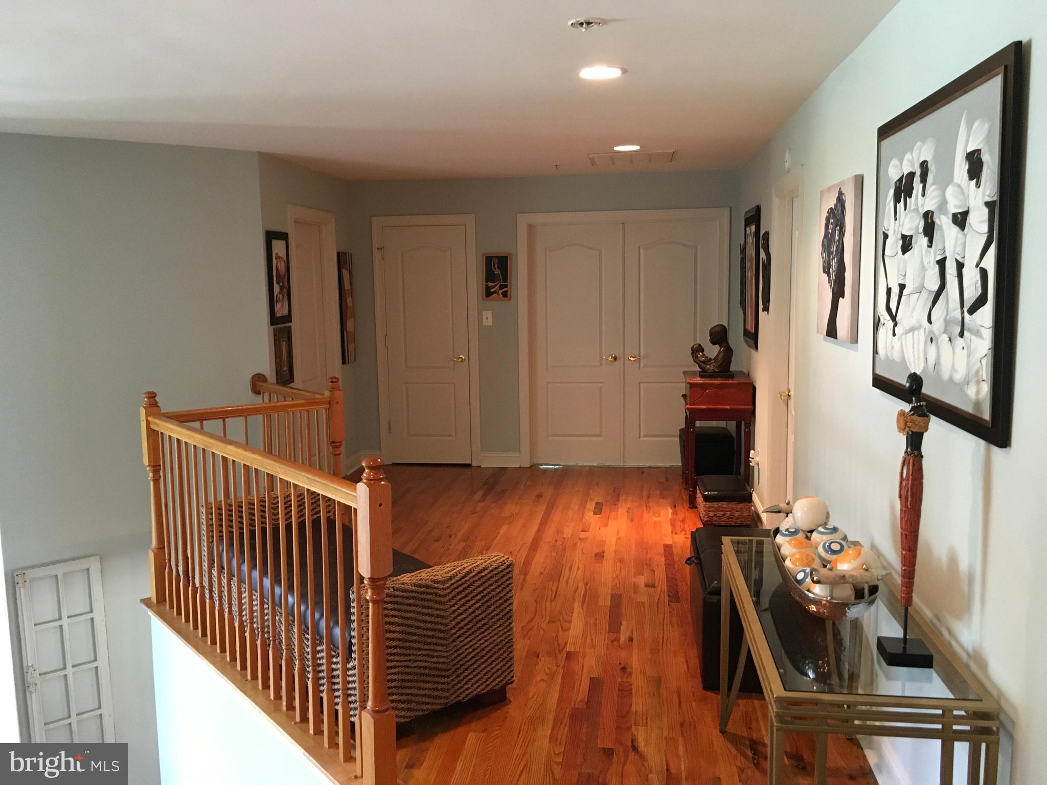 3919 Woodreed Drive Brandywine, MD 20613 - Photo 39 of 88 a room with furniture and wooden floor