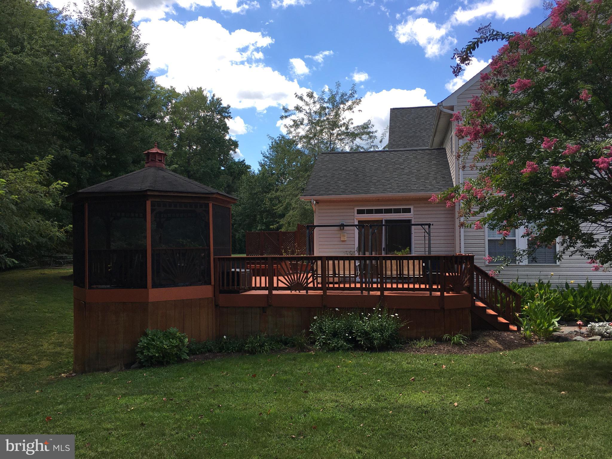 3919 Woodreed Drive Brandywine, MD 20613 - Photo 79 of 88 a front view of a house with garden