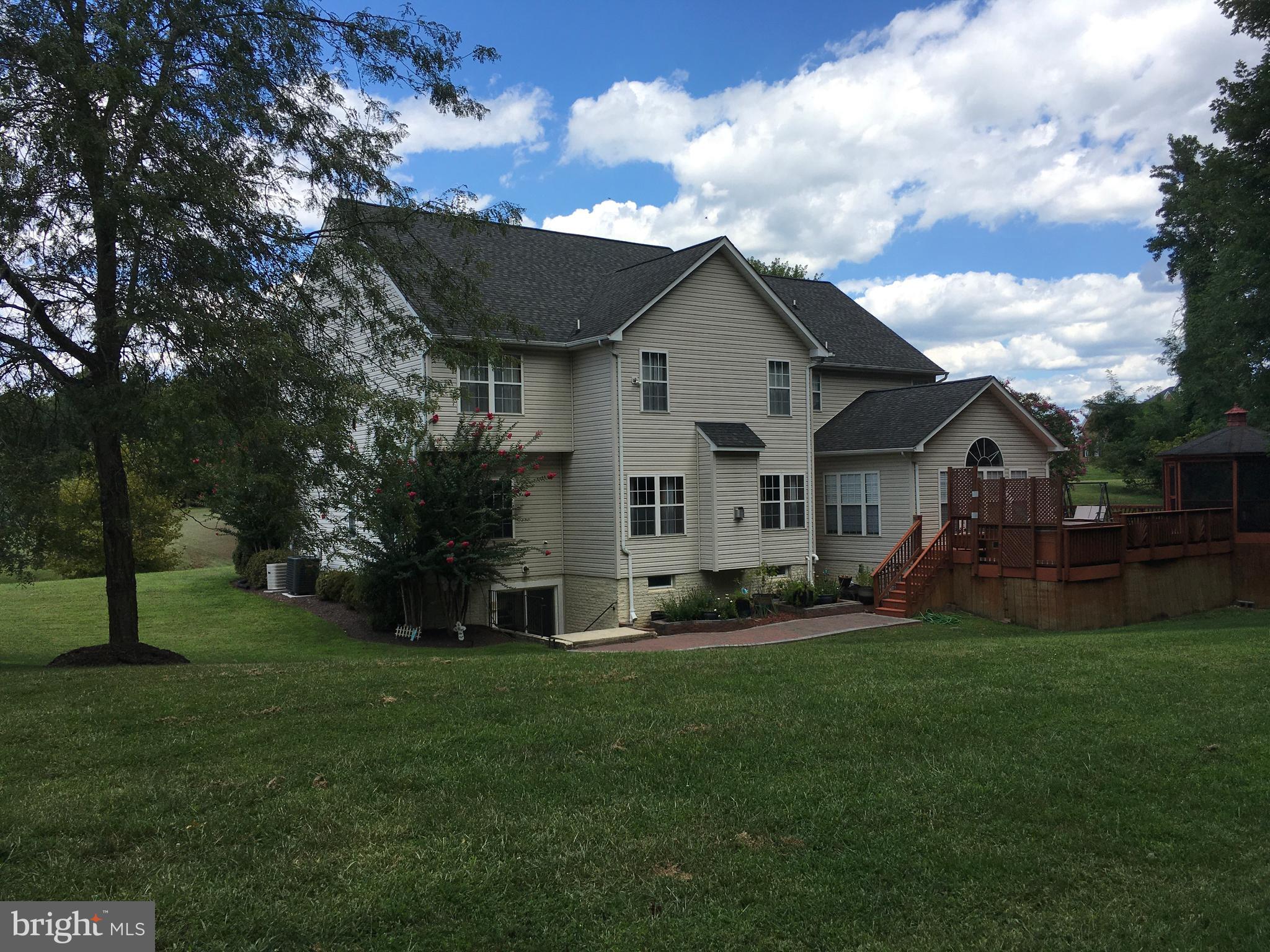 3919 Woodreed Drive Brandywine, MD 20613 - Photo 82 of 88 a view of a house with a big yard and sitting area