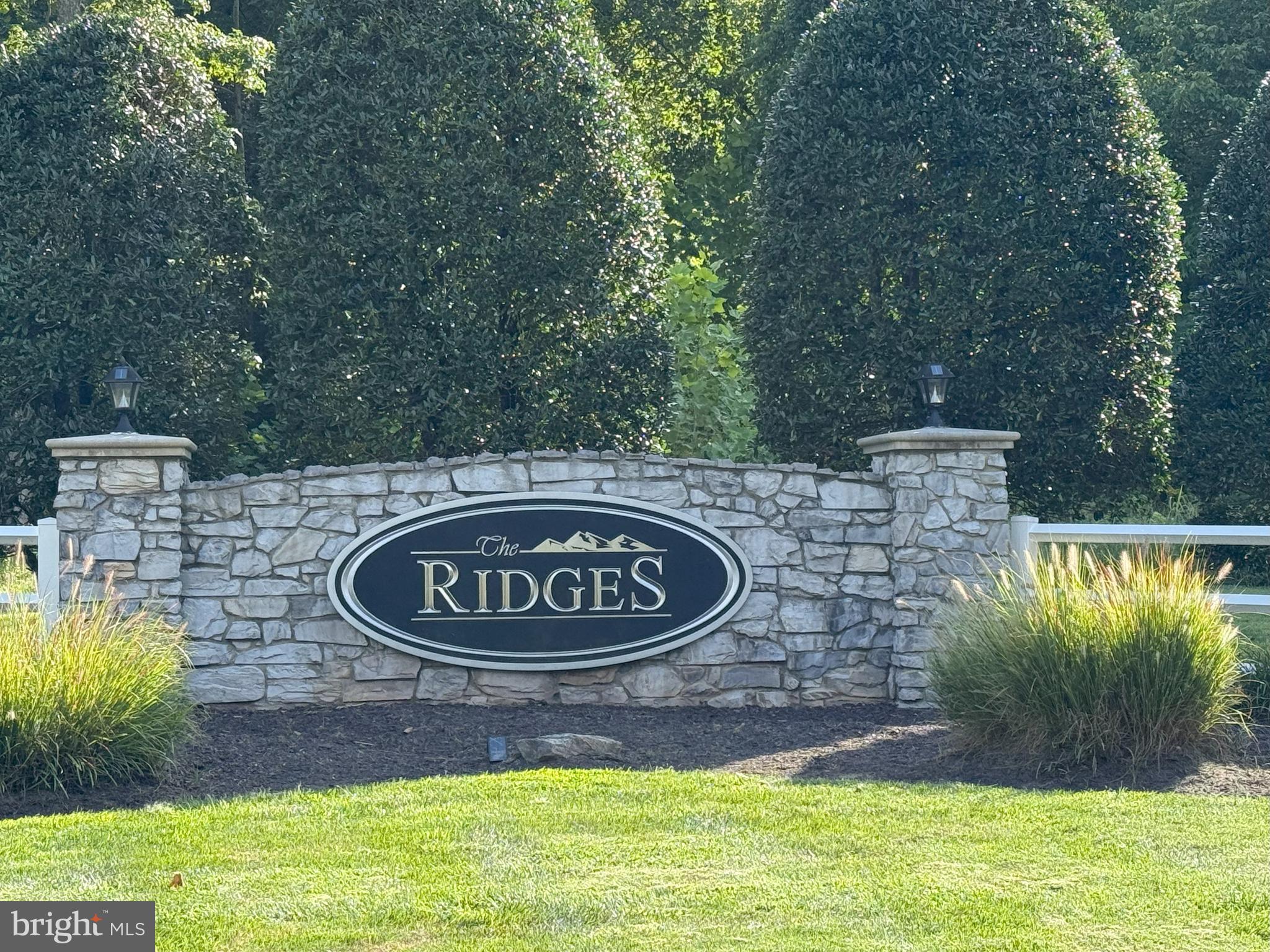 3919 Woodreed Drive Brandywine, MD 20613 - Photo 88 of 88 a wooden bench sitting in the middle of a yard