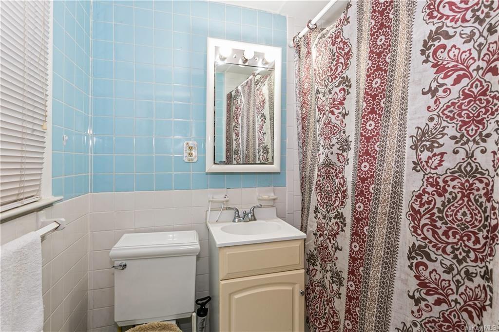 9 Locust Road North Salem, NY 10509 - Photo 5 of 11 a bathroom with a sink toilet and shower