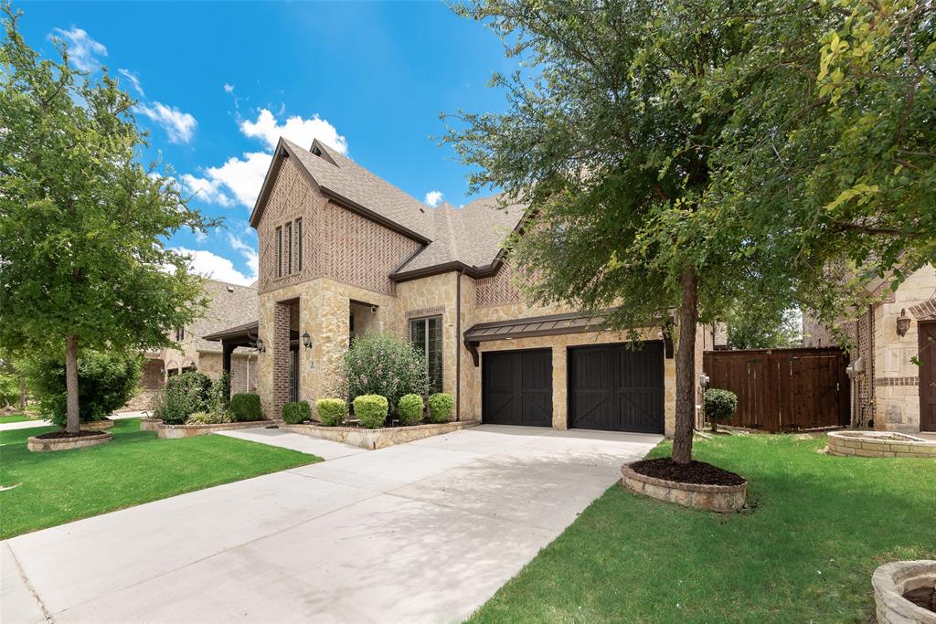 2021 Calisto Way Allen, TX 75013 - Photo 3 of 34 Stone and brick exterior with a multi-level roofline