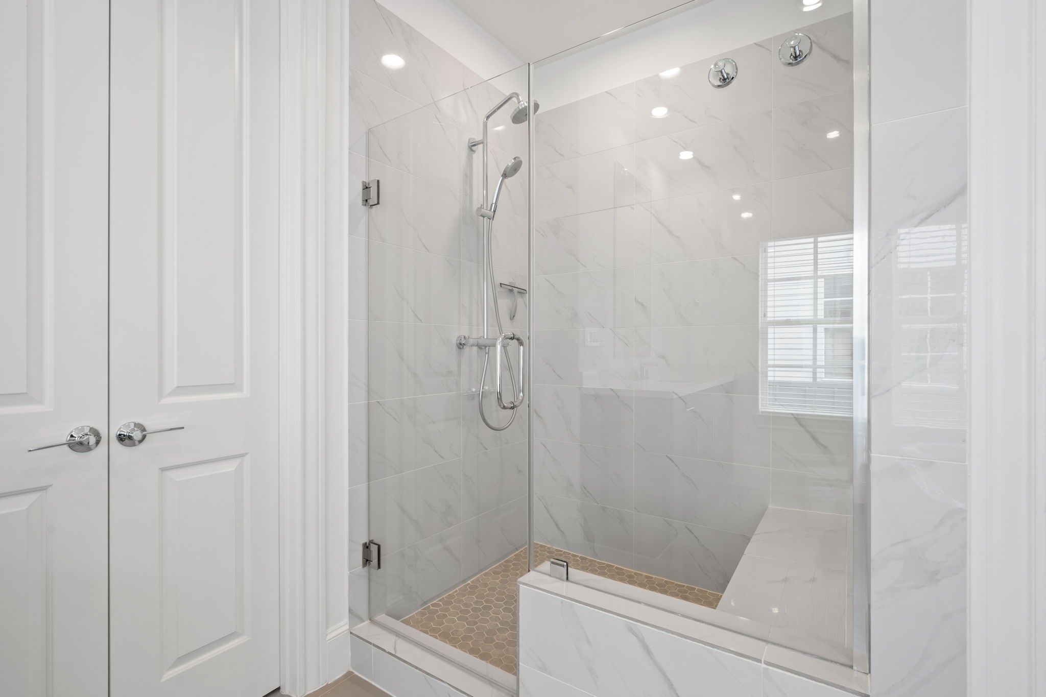 614 Delmar Street Houston, TX 77023 - Photo 29 of 36 a bathroom with a shower and a sink