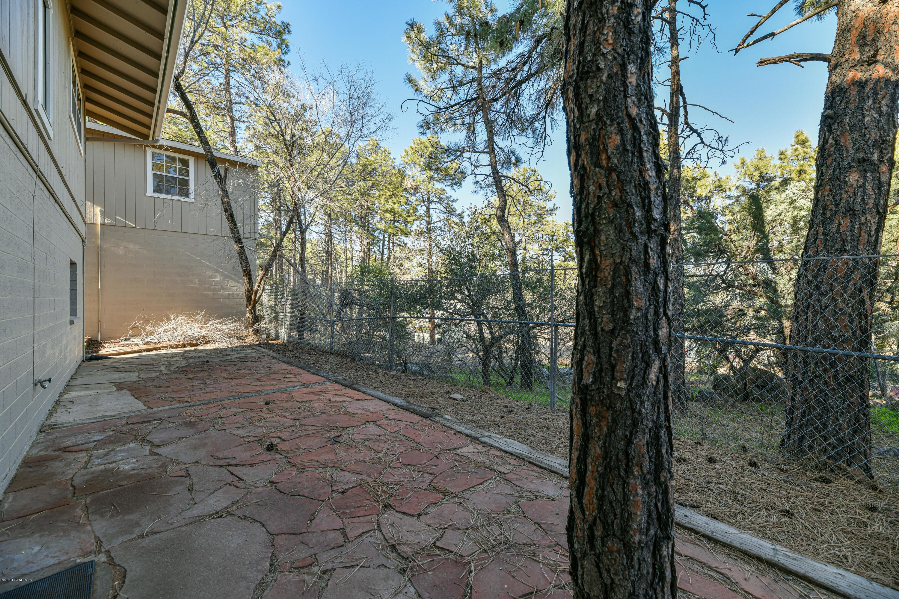 916 Sundown Road Prescott, AZ 86303 - Photo 27 of 30 Tall pines in yard