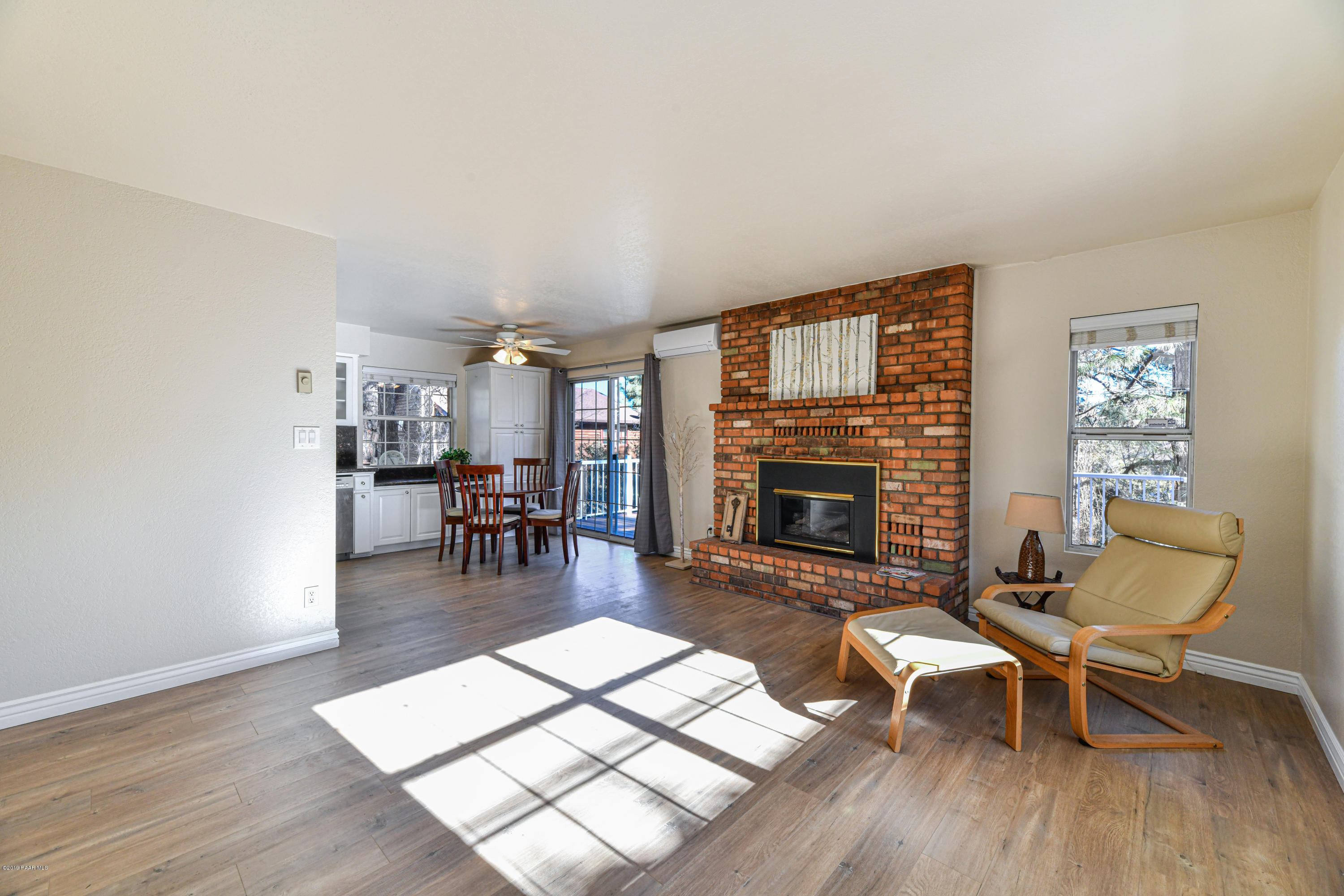916 Sundown Road Prescott, AZ 86303 - Photo 9 of 30 Living area with gas fireplace