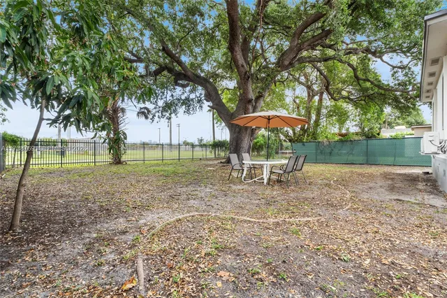a house with trees in front of it