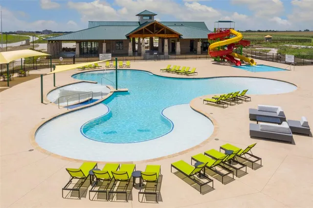 an aerial view of a swimming pool