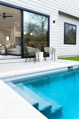 a bathroom with a sink a mirror and a bathtub