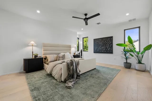 a bed room with a bed and a couch